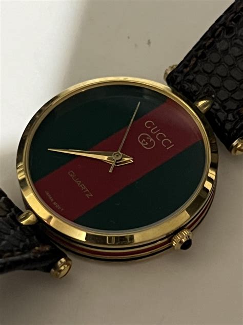 old gucci watches with raised glass cover